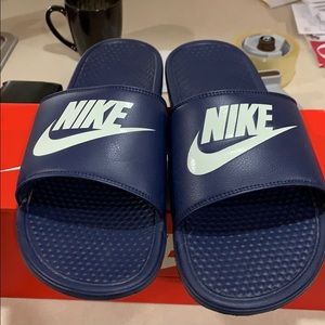 One pair of new Nike sandals